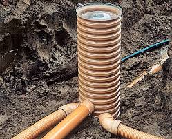 Дренажный колодец: ключевой элемент системы водоотведения и дренажа на вашем участке